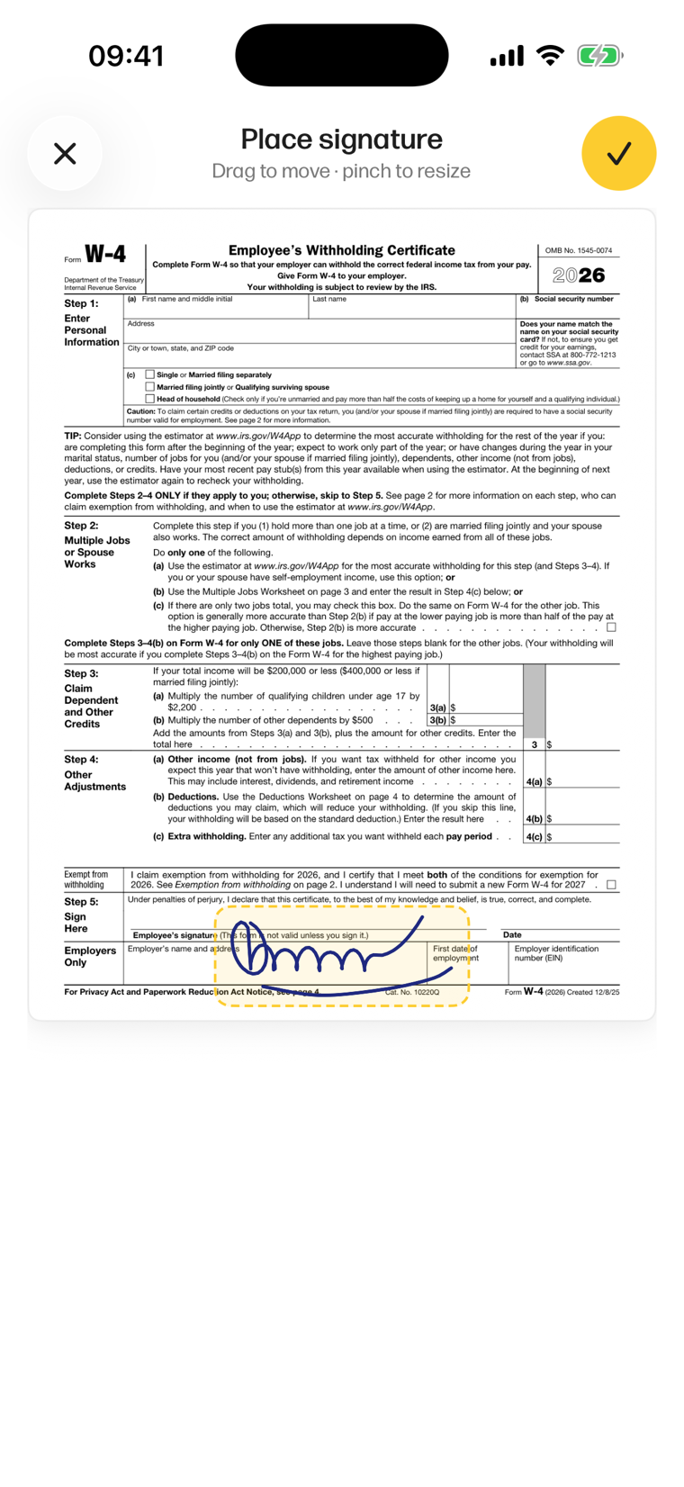 The saved signature dropped onto the W-4's signature line — drag to move, pinch to resize